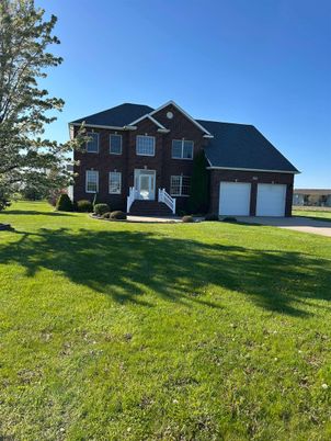 Attached, Backyard, Exterior, Facade, Brick Facade, Brick Traditional