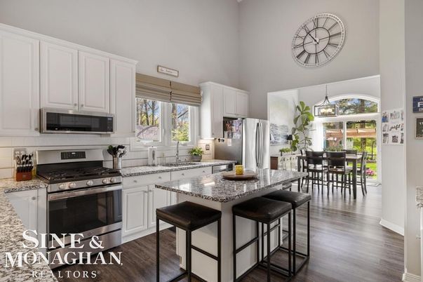 Dining room, Interior, Kitchen, Pendant Lights, Stainless Steel Appliances, Wood Texture Flooring