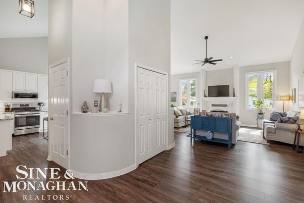 Fireplace, Interior, Kitchen, Living room, Recessed Lighting, Stainless Steel Appliances, Wood Texture Flooring