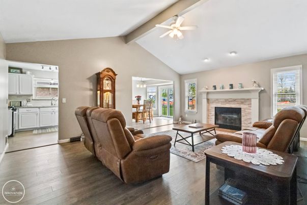 Chandelier, Dining room, Fireplace, Interior, Living room, Recessed Lighting, Wood Texture Flooring