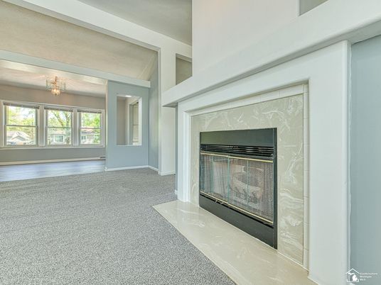 Chandelier, Empty room, Fireplace, Interior