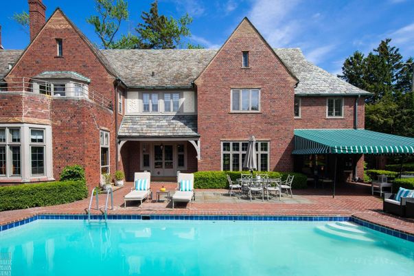 Exterior, Facade, Brick Facade, Pool, Tudor Revival