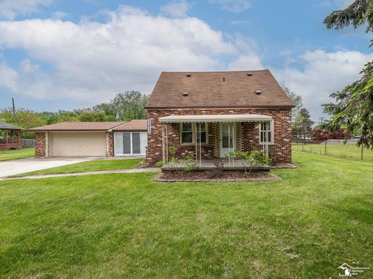 Attached, Backyard, Exterior, Facade, Brick Facade, Cape Cod