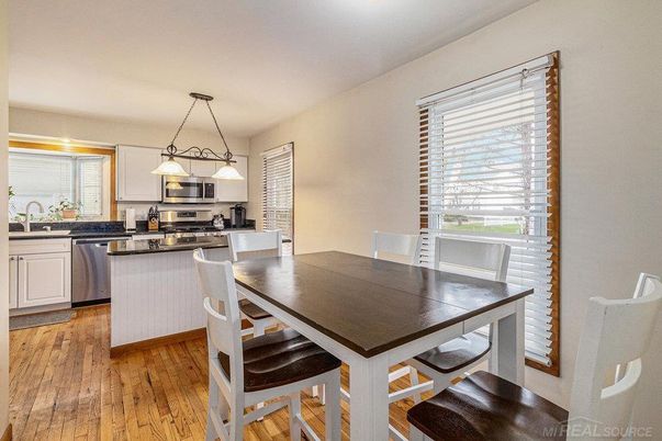 Dining room, Interior, Kitchen, Pendant Lights, Stainless Steel Appliances, Wood Texture Flooring
