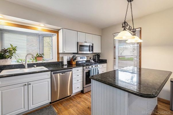Interior, Kitchen, Pendant Lights, Recessed Lighting, Stainless Steel Appliances, Wood Texture Flooring