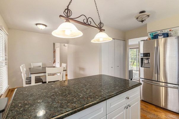 Dining room, Interior, Kitchen, Pendant Lights, Stainless Steel Appliances, Wood Texture Flooring