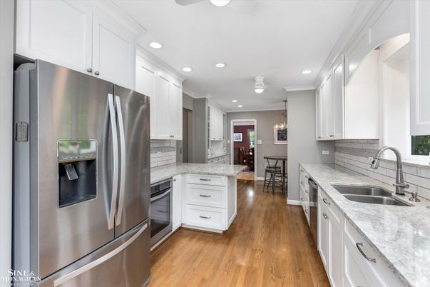 Dining room, Interior, Kitchen, Recessed Lighting, Stainless Steel Appliances, Wood Texture Flooring