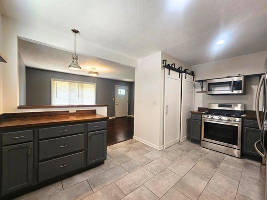 Interior, Kitchen, Pendant Lights, Recessed Lighting, Stainless Steel Appliances, Wood Texture Flooring