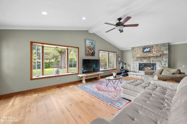 Fireplace, Fitness Equipment, Interior, Living room, Recessed Lighting, Stone Walls, Wood Texture Flooring