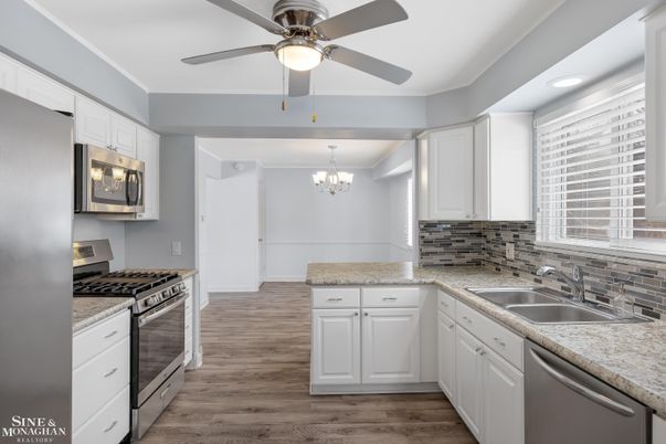 Chandelier, Interior, Kitchen, Recessed Lighting, Stainless Steel Appliances, Wood Texture Flooring
