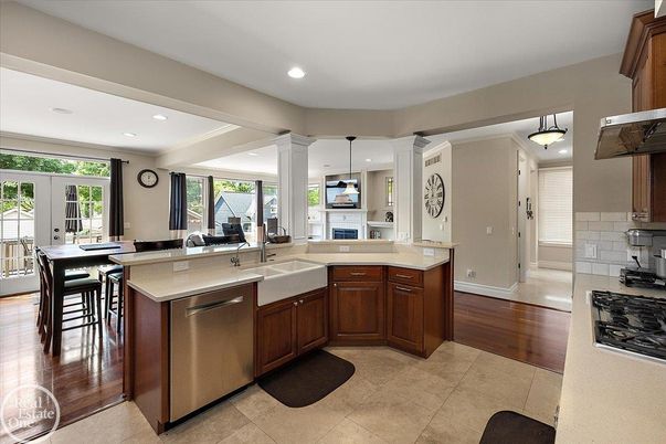 Dining room, Fireplace, Interior, Kitchen, Pendant Lights, Recessed Lighting, Stainless Steel Appliances, Wood Texture Flooring