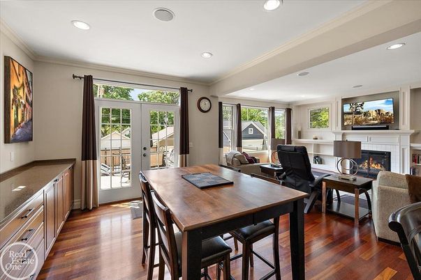 Dining room, Fireplace, Interior, Living room, Recessed Lighting, Wood Texture Flooring