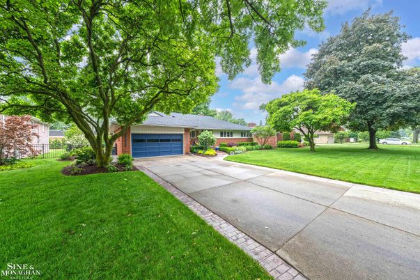 Attached, Backyard, Exterior, Facade, Brick Facade, Ranch