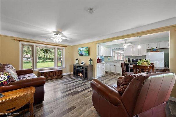 Dining room, Fireplace, Interior, Kitchen, Living room, Pendant Lights, Wood Texture Flooring