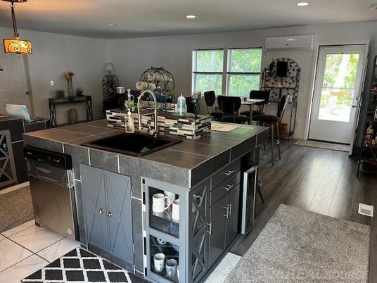 Dining room, Interior, Kitchen, Pendant Lights, Recessed Lighting, Tile Countertops, Wood Texture Flooring