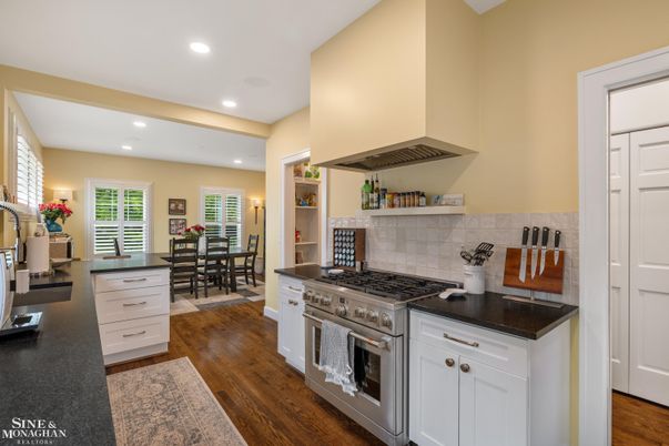 Dining room, Interior, Kitchen, Recessed Lighting, Stainless Steel Appliances, Wood Texture Flooring