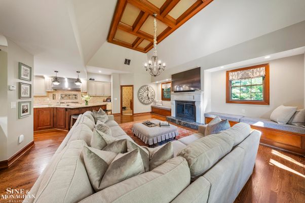 Chandelier, Fireplace, Interior, Kitchen, Living room, Recessed Lighting, Wood Texture Flooring