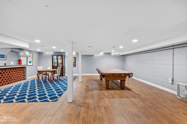Billiard Table, Game Room, Interior, Recessed Lighting, Stone Walls, Wood Texture Flooring