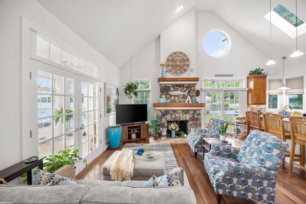 Dining room, Fireplace, Interior, Living room, Pendant Lights, Recessed Lighting, Wood Texture Flooring