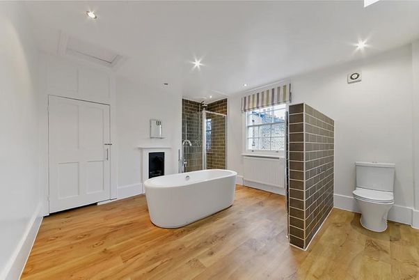 Bathroom, Fireplace, Free Standing Baths, Interior, Recessed Lighting, Wood Texture Flooring