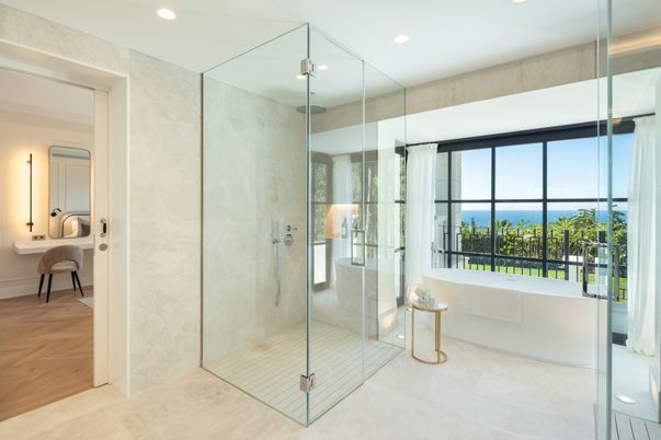 Bathroom, Free Standing Baths, Glass Shower, Interior, Recessed Lighting, Wood Texture Flooring