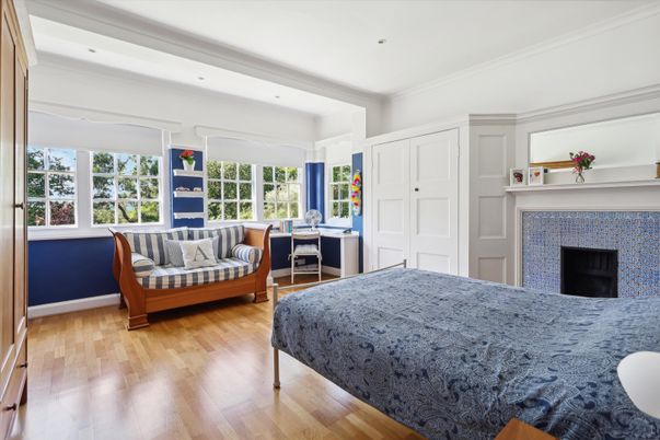 Bedroom, Fireplace, Interior, Recessed Lighting, Wood Texture Flooring