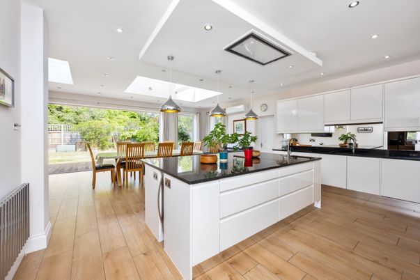 Dining room, Interior, Kitchen, Pendant Lights, Recessed Lighting, Stainless Steel Appliances, Wood Texture Flooring