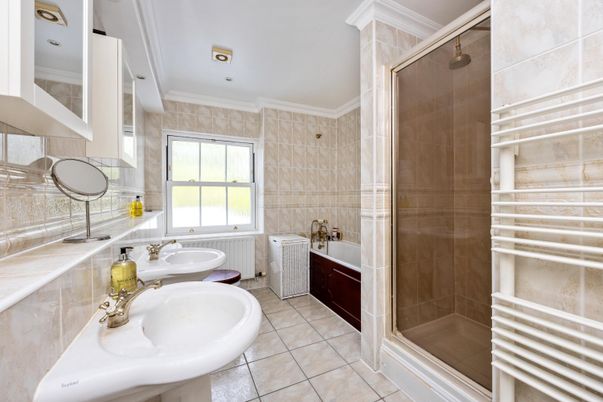 Bathroom, Dual Sink Vanities, Glass Shower, Interior, Recessed Lighting, Tile Countertops