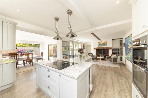 Dining room, Fireplace, Interior, Kitchen, Living room, Pendant Lights, Recessed Lighting, Stainless Steel Appliances, Wooden Beams, Wood Texture Flooring