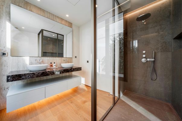 Bathroom, Dual Sink Vanities, Glass Shower, Interior, Recessed Lighting, Wood Texture Flooring