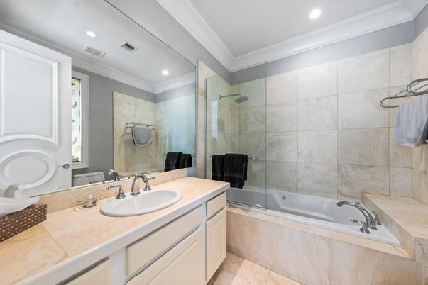 Bathroom, Dual Sink Vanities, Glass Shower, Interior, Recessed Lighting, Tile Countertops