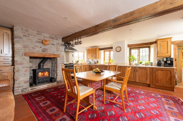 Dining room, Fireplace, Interior, Kitchen, Recessed Lighting, Stone Walls, Wooden Beams