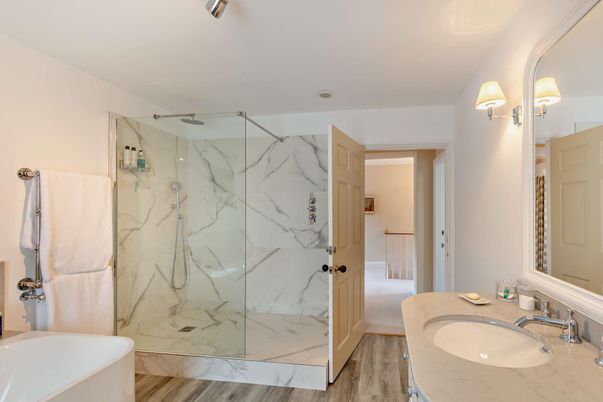 Bathroom, Glass Shower, Interior, Marble Walls, Wood Texture Flooring