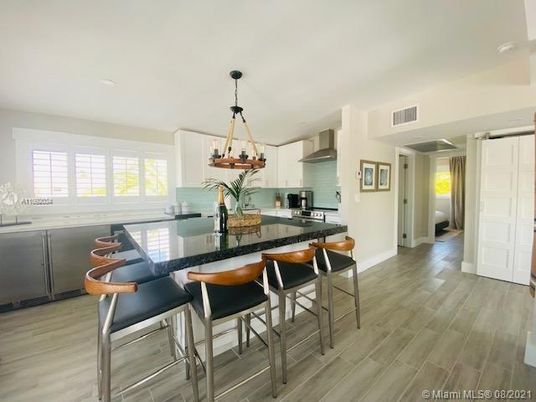 Chandelier, Interior, Kitchen, Pendant Lights, Recessed Lighting, Stainless Steel Appliances, Wood Texture Flooring