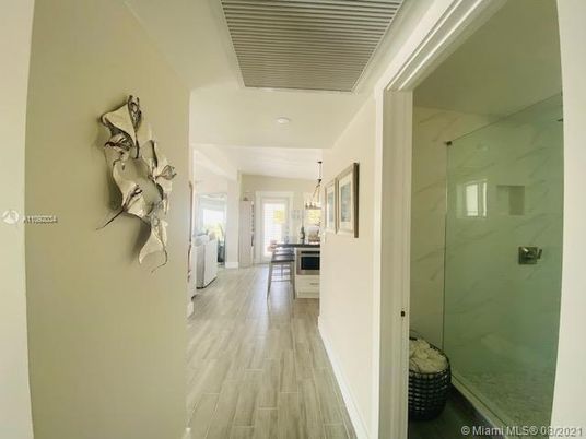 Interior, Marble Walls, Pendant Lights, Recessed Lighting, Wood Texture Flooring