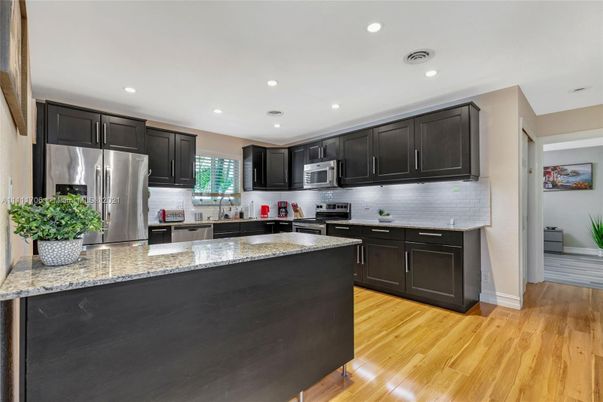 Interior, Kitchen, Recessed Lighting, Stainless Steel Appliances, Wood Texture Flooring