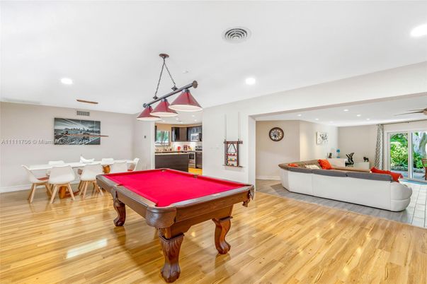 Billiard Table, Dining room, Game Room, Interior, Living room, Pendant Lights, Recessed Lighting, Wood Texture Flooring