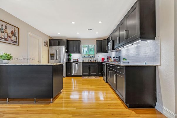 Interior, Kitchen, Recessed Lighting, Stainless Steel Appliances, Wood Texture Flooring