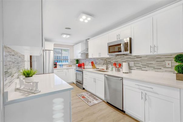 Interior, Kitchen, Recessed Lighting, Stainless Steel Appliances, Wood Texture Flooring