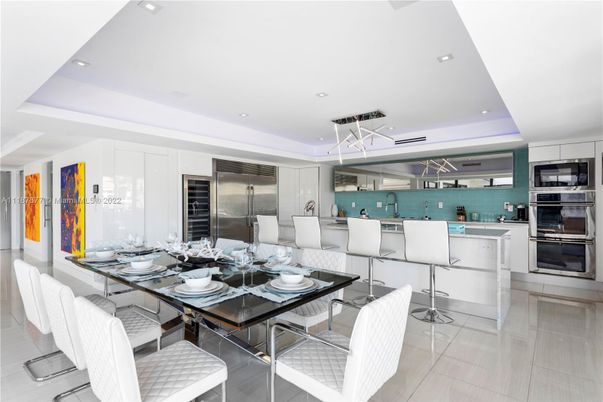 Dining room, Interior, Kitchen, Pendant Lights, Recessed Lighting, Stainless Steel Appliances, Wood Texture Flooring