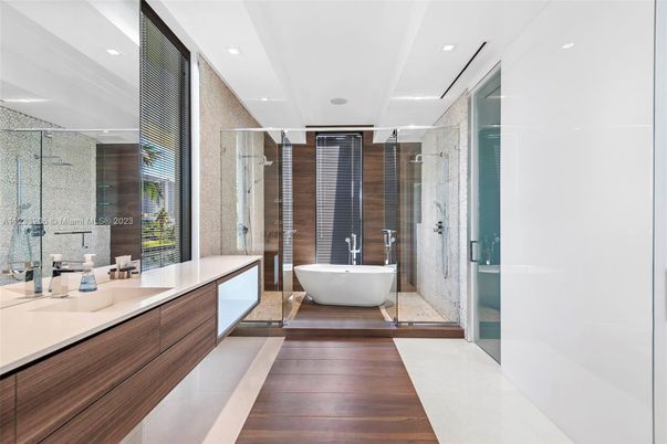 Bathroom, Dual Sink Vanities, Free Standing Baths, Glass Shower, Interior, Recessed Lighting, Wood Texture Flooring