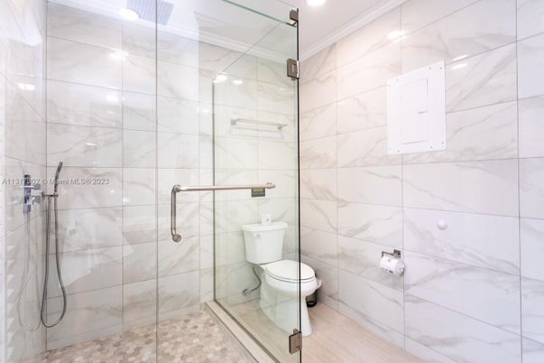Bathroom, Glass Shower, Interior, Marble Walls, Recessed Lighting, Wood Texture Flooring