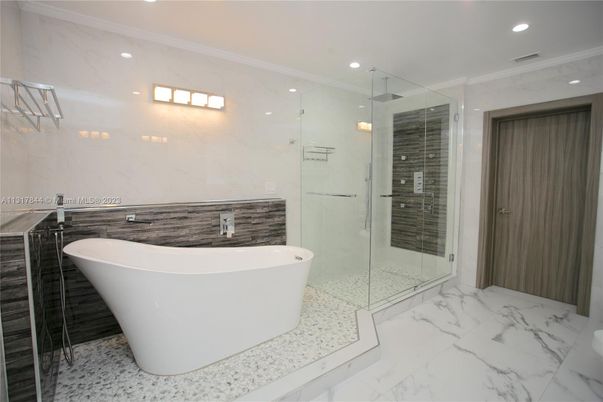 Bathroom, Free Standing Baths, Glass Shower, Interior, Marble, Marble Walls, Recessed Lighting