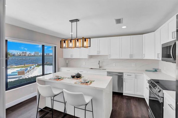 Interior, Kitchen, Pendant Lights, Recessed Lighting, Stainless Steel Appliances, Water, Wood Texture Flooring