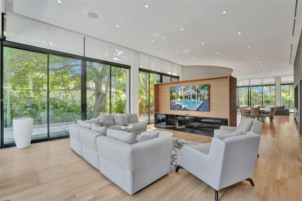 Dining room, Fireplace, Interior, Living room, Recessed Lighting, Wood Texture Flooring, Wooden Walls