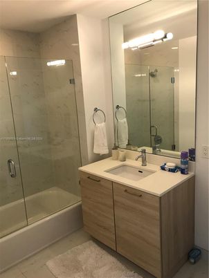 Bathroom, Dual Sink Vanities, Glass Shower, Interior, Marble Walls