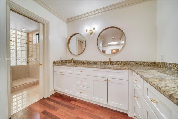Bathroom, Dual Sink Vanities, Glass Shower, Interior, Wood Texture Flooring