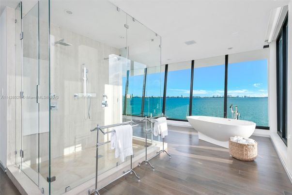 Bathroom, Free Standing Baths, Glass Shower, Interior, Recessed Lighting, Water, Wood Texture Flooring