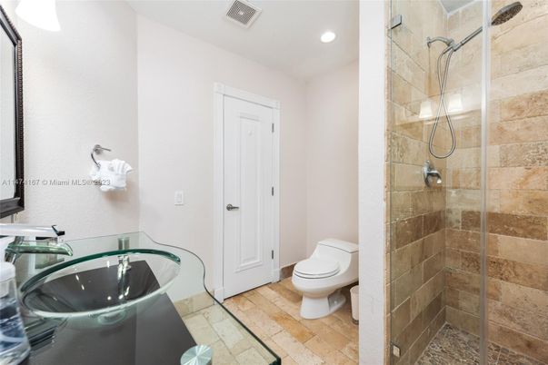 Bathroom, Glass Shower, Interior, Recessed Lighting, Stone Walls