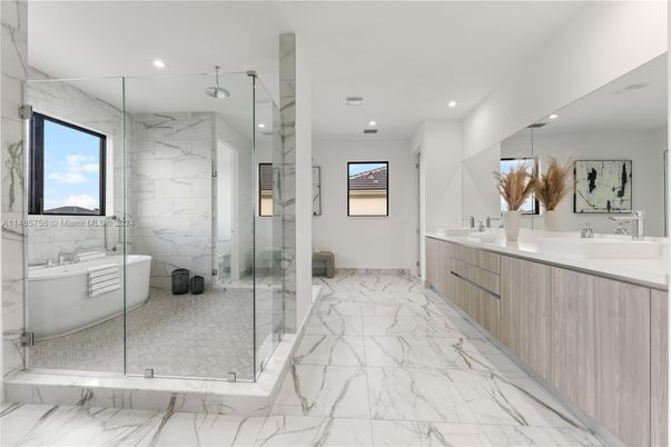 Bathroom, Dual Sink Vanities, Free Standing Baths, Glass Shower, Interior, Marble, Marble Walls, Recessed Lighting